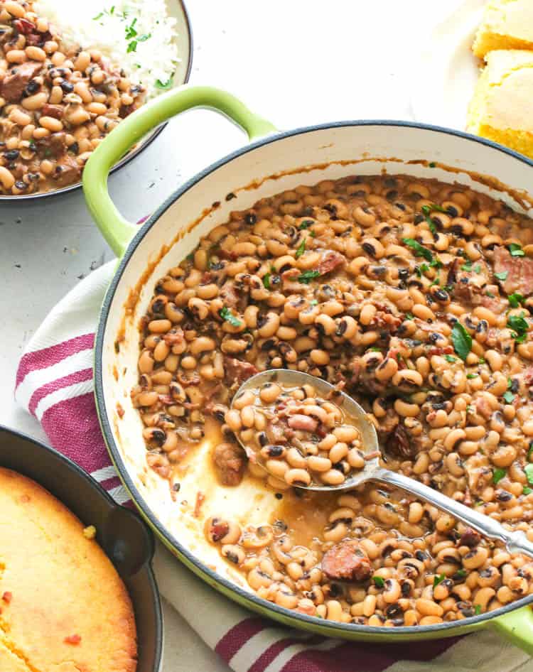 Hoppin John in a pot with serving spoon