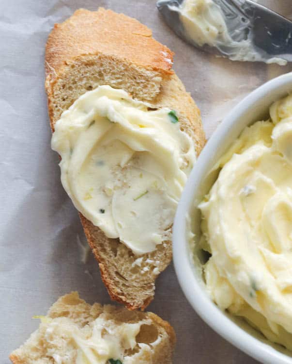 a slice of crusty bread slathered with garlic butter