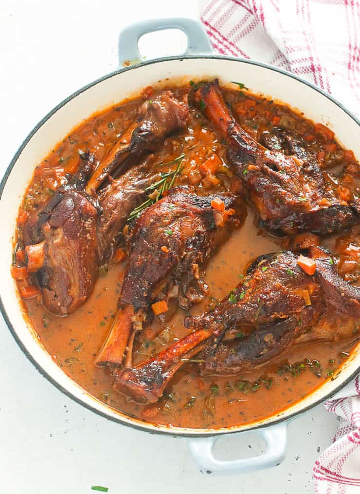 Braised lamb shanks cooked in a Dutch oven