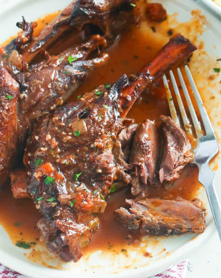 Braised Lamb Shank in a pan