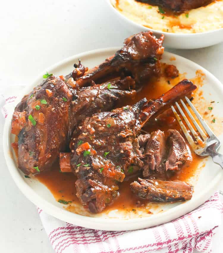 Braised Lamb Shank in a pan