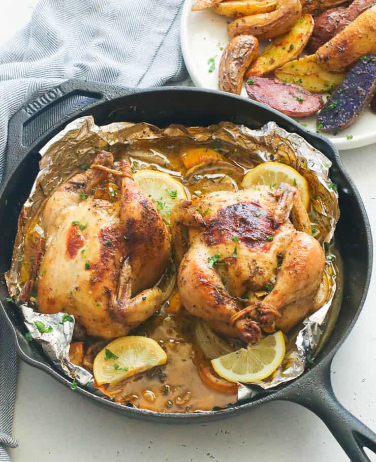 Roast Cornish Hens served with roasted potato wedges