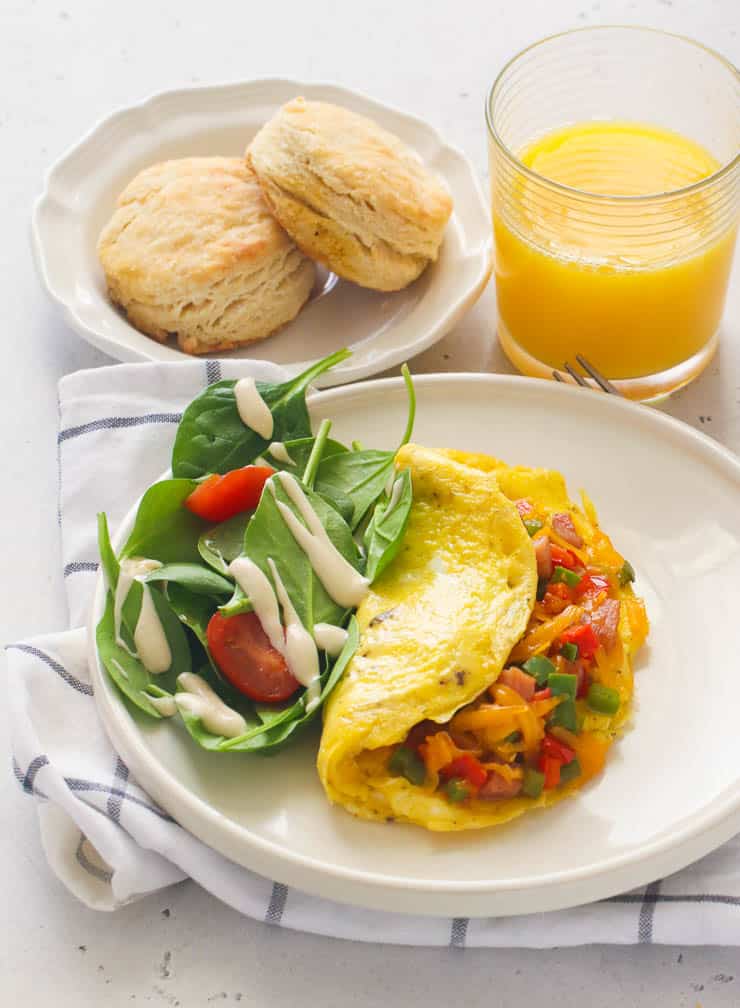 Breakfast meal - omelette, biscuits and juice