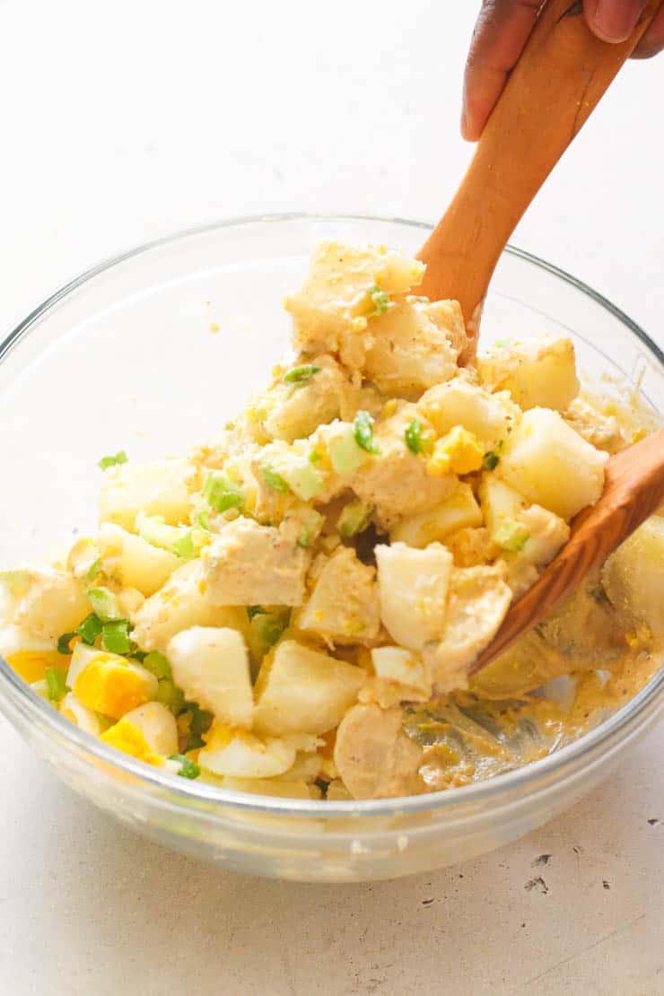 Enjoying potato salad with the family.