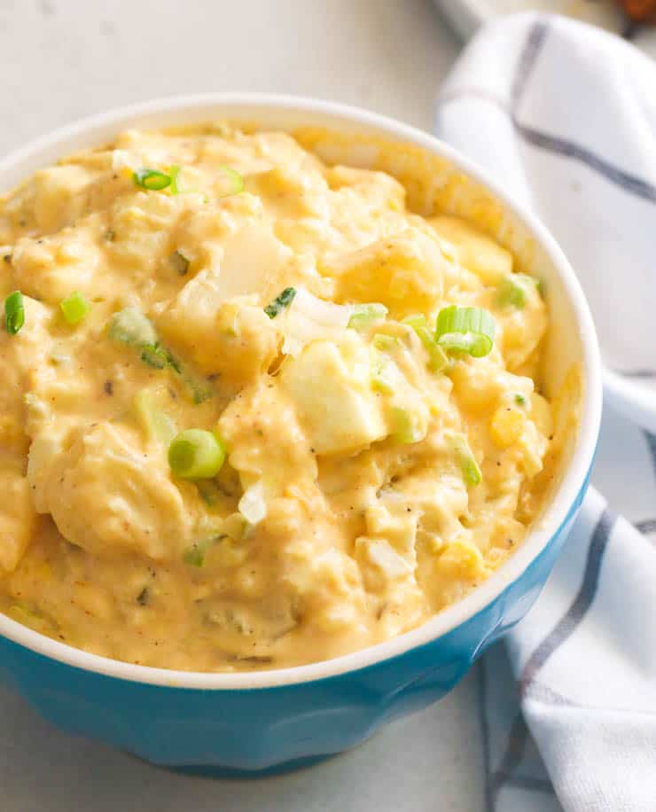 Old fashioned potato salad ready to go on a picnic.