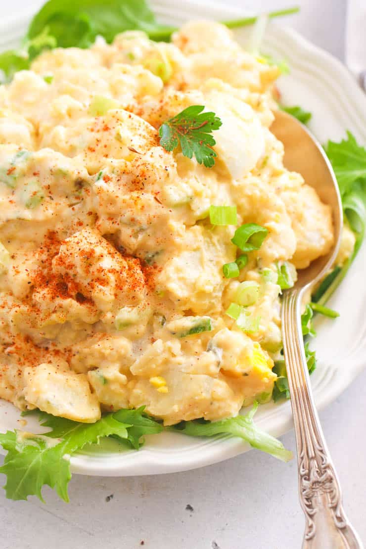 Southern Potato Salad on a bed of lettuce ready to serve