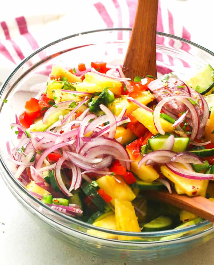 Pineapple Cucumber Salad in a clear bowl