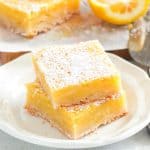 Lemon Bars in a Plate and ready to go with you on a picnic