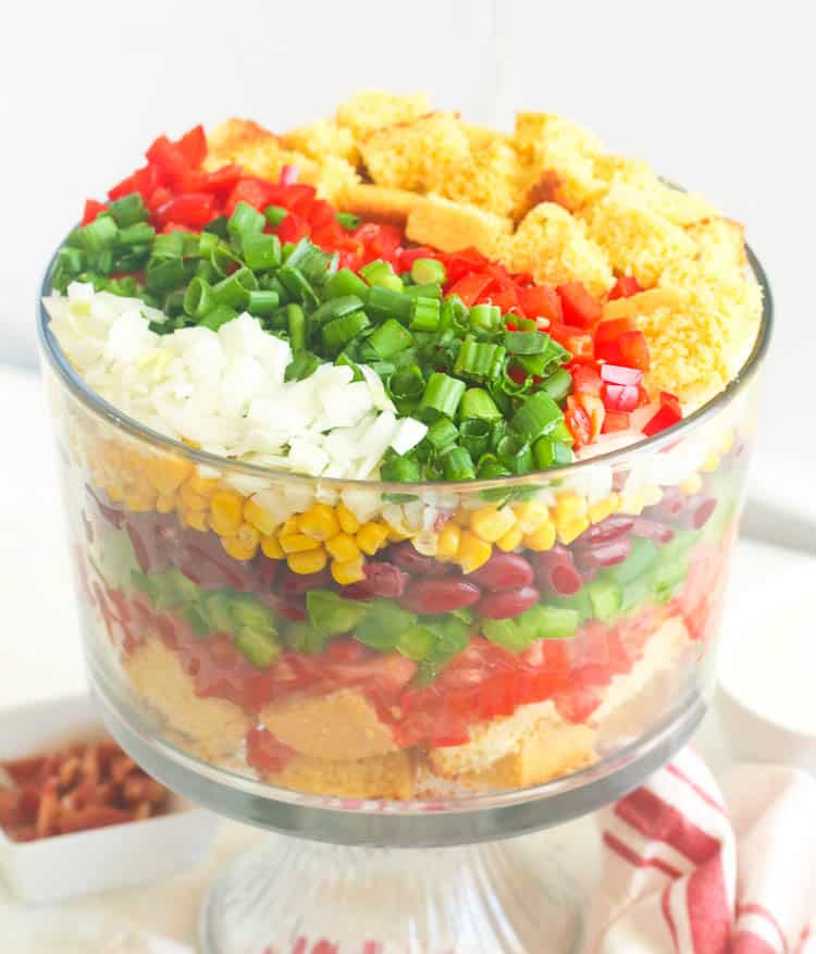 An assembled Cornbread Salad ready to dress and enjoy