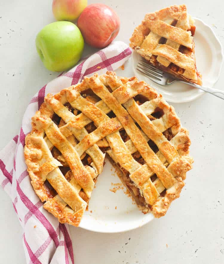 Apple Pie with One Slice Served on a Separate Plate 