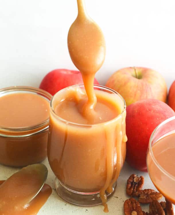 Caramel Sauce or Dip with Some Apples in the Background