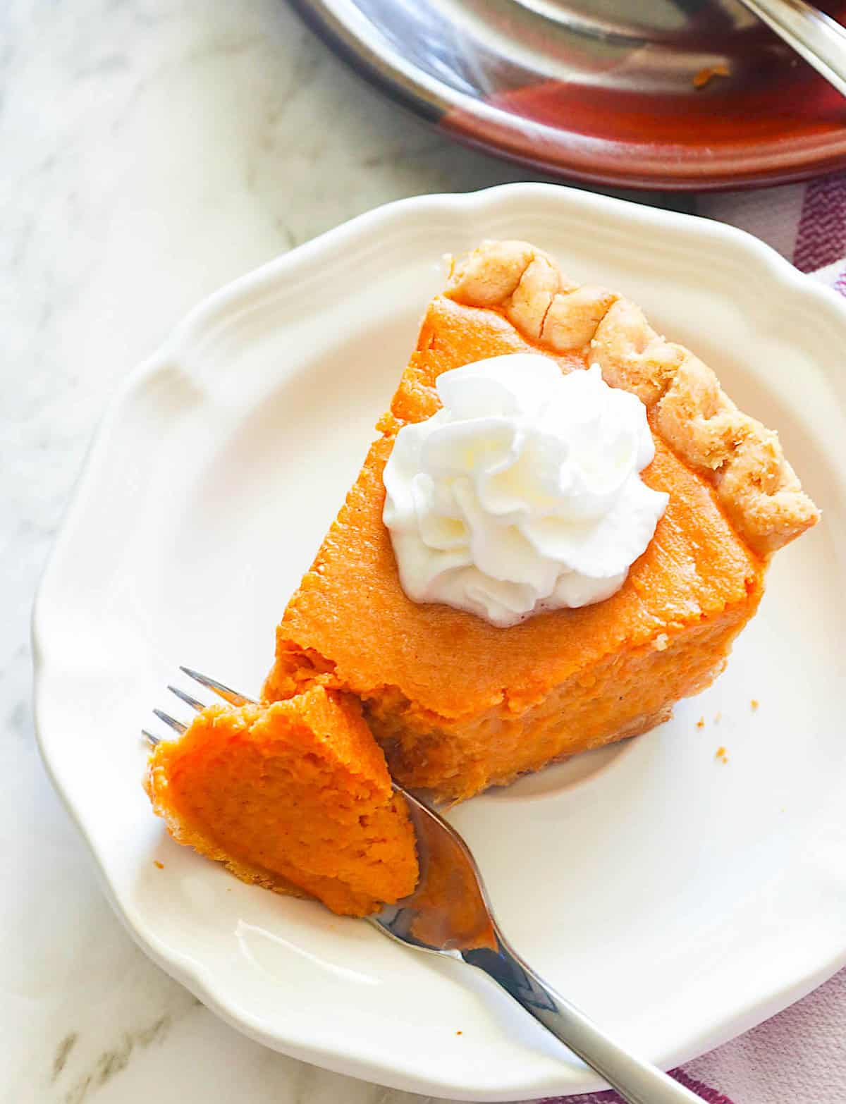 Enjoying a slice of sweet potato pie