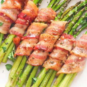 Bacon Wrapped Asparagus on a white plate