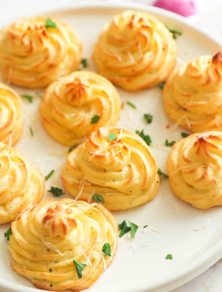 Duchess Potatoes on a white plate for easter 