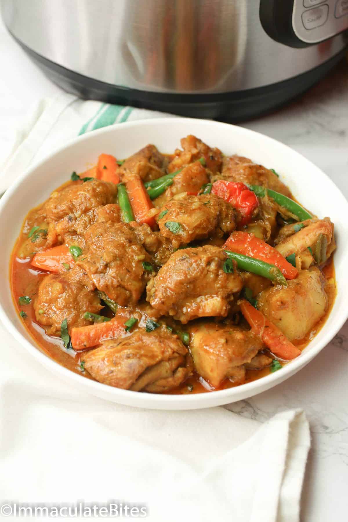 Instant Pot Chicken Curry in a white bowl