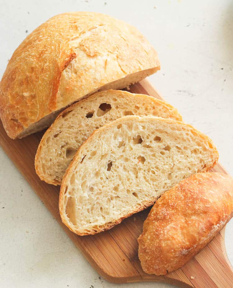 Sliced No Knead Bread on a Chopping Board