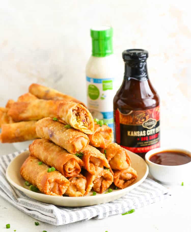Stacked Pork Egg Rolls in a Plate Served with Dip