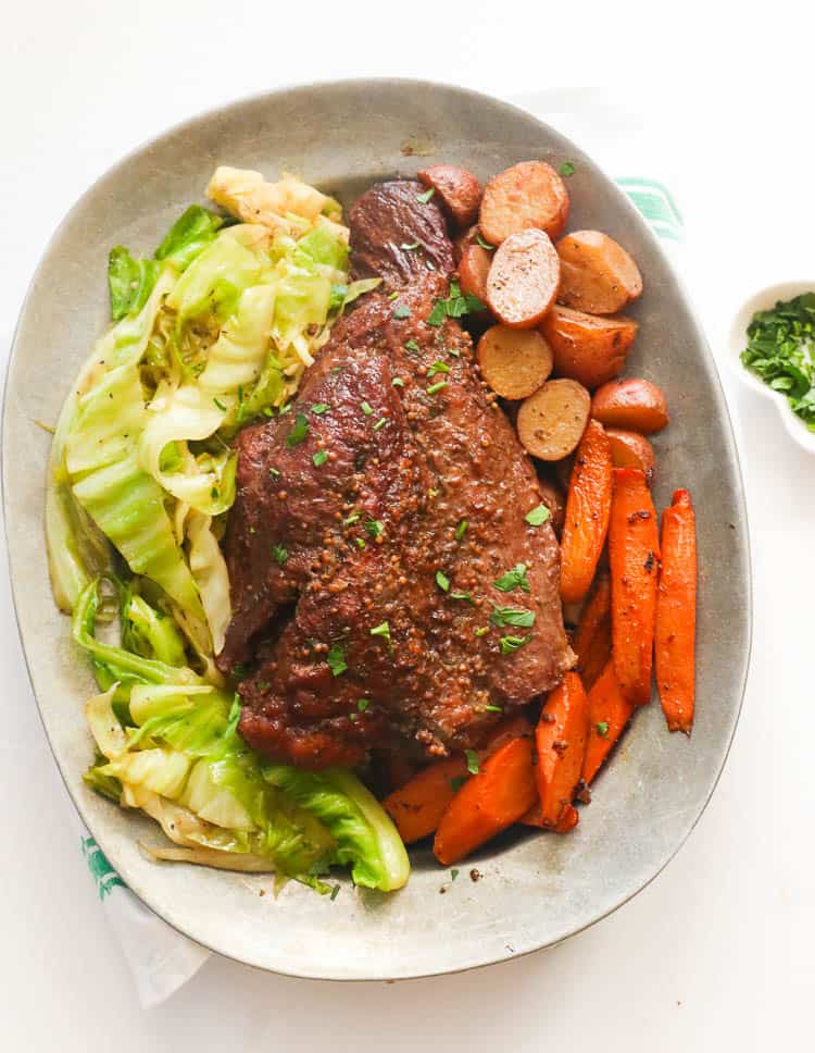 Cornbed Beef and Cabbge with Potatoes and Carrots in a Plate