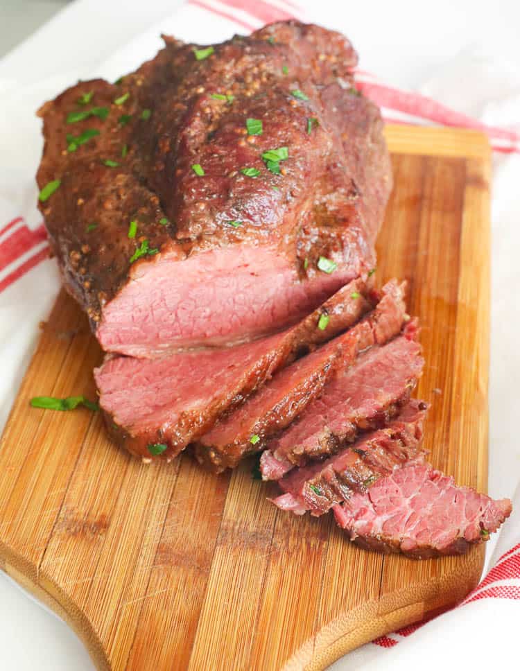 Sliced Corned Beef on a Chopping Board