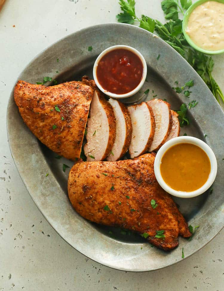 smoked chicken on a silver platter