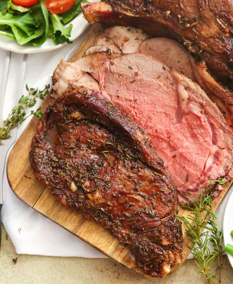 Slices of Smoked Prime Rib on a Chopping Board