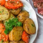 Roasted Potatoes and Carrots topped with fresh pasley