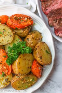 Roasted Potatoes and Carrots topped with fresh pasley