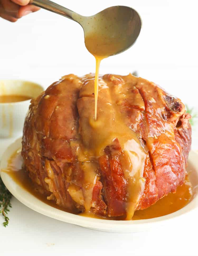 A Slow Cooker Whole Ham glazed with Honey mixture