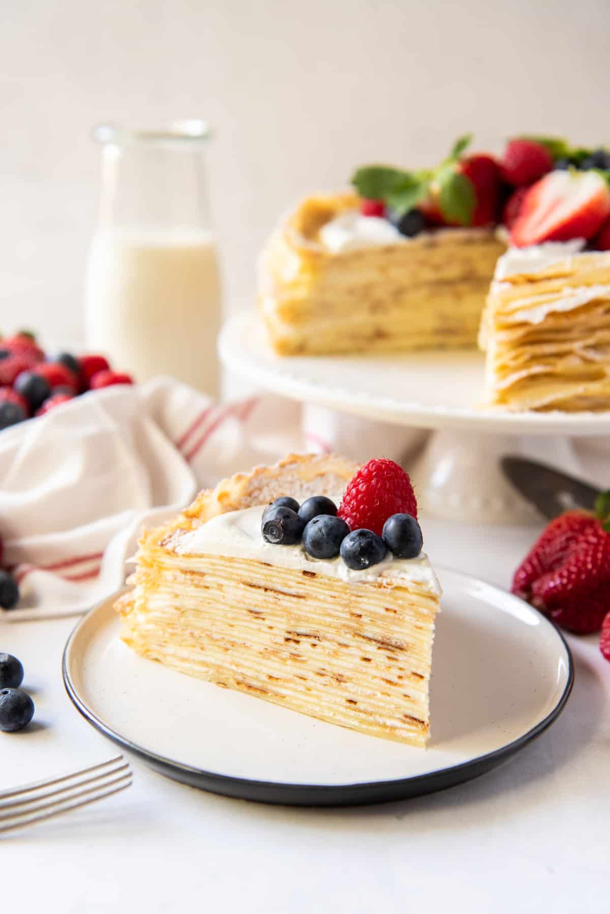 Serving of Easy Crepe Cake on White Plate