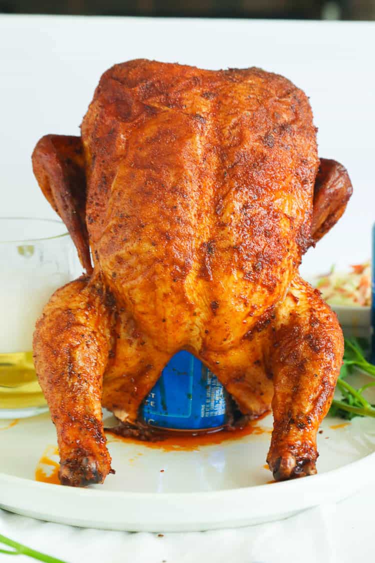 upright whole chicken on a beer can