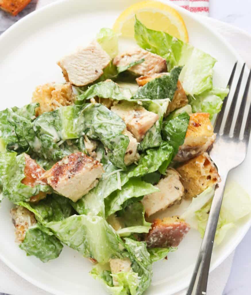 Chicken Caesar Salad in a white bowl