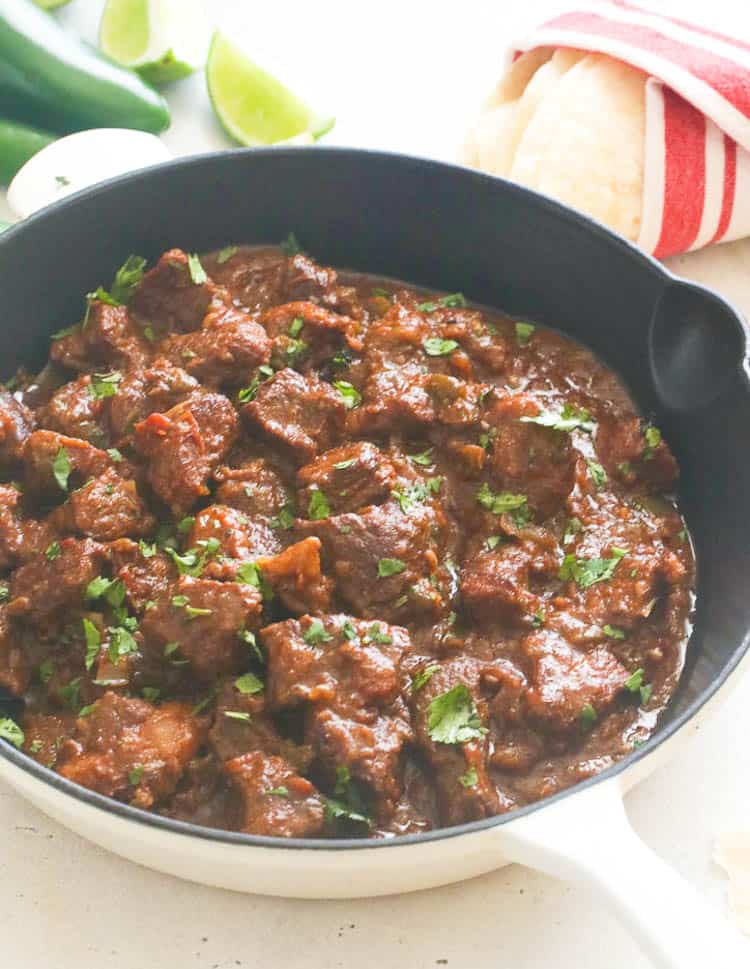 Carne Guisada in a cast iron