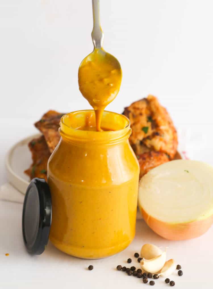 Mustard BBQ Sauce with spoon