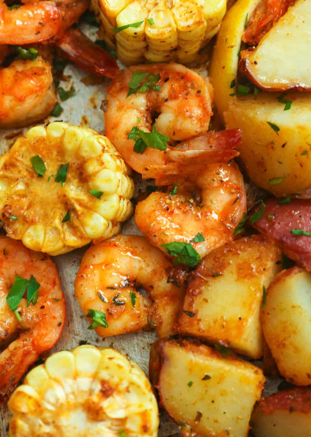 Cajun shrimp boil on a baking sheet