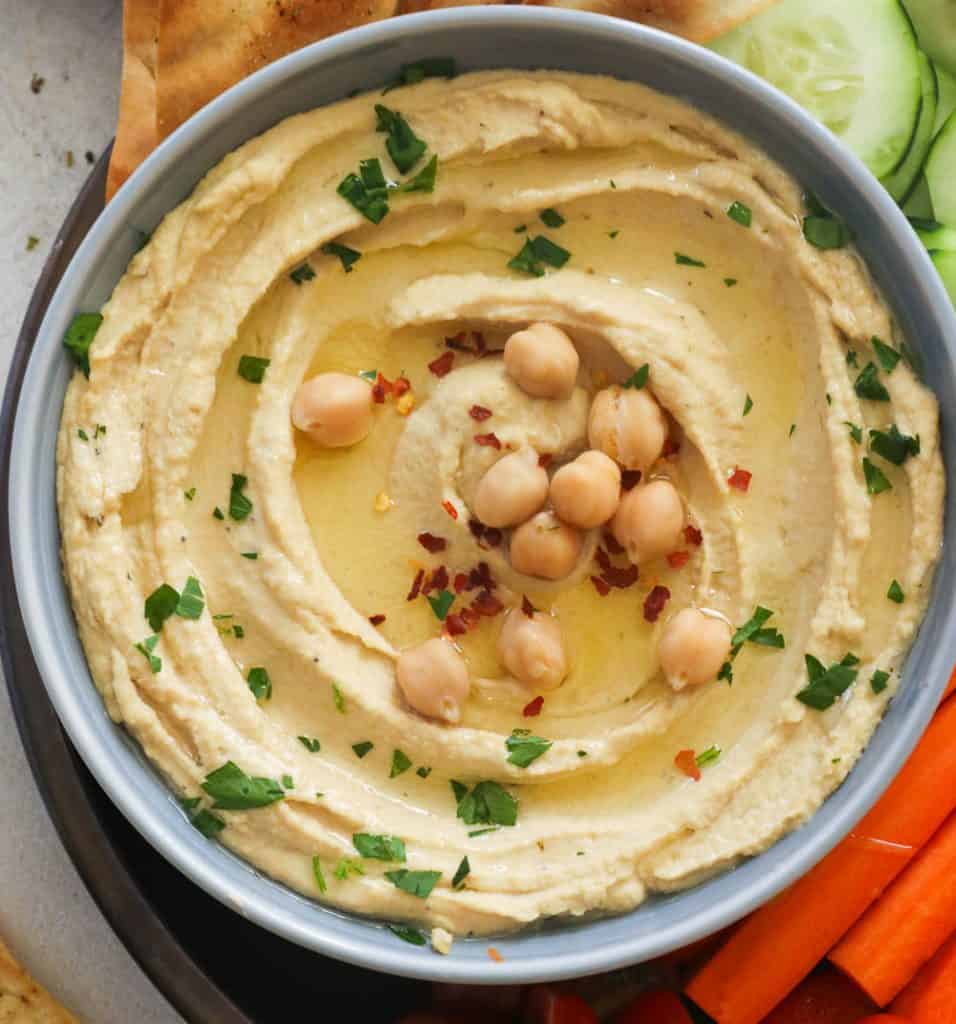 A bowl of smooth and creamy hummus