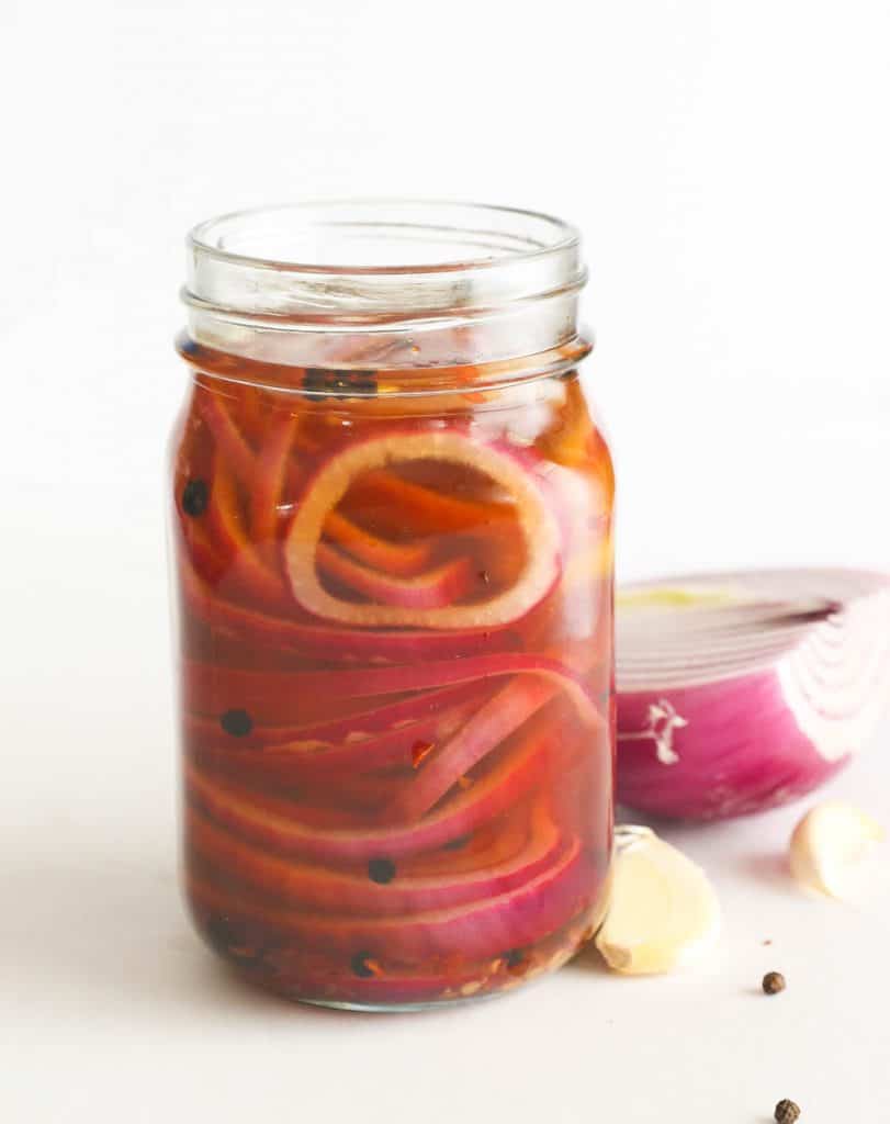 pickled onions with pepper and garlic cloves
