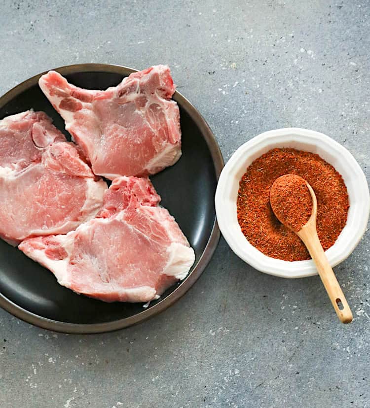 Getting ready to season the pork chops.