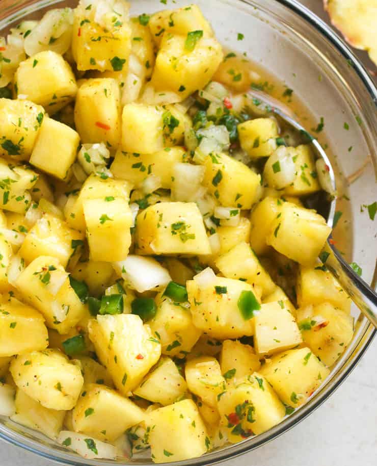 Up Close Shot of Pineapple Salsa in a Clear Bowl