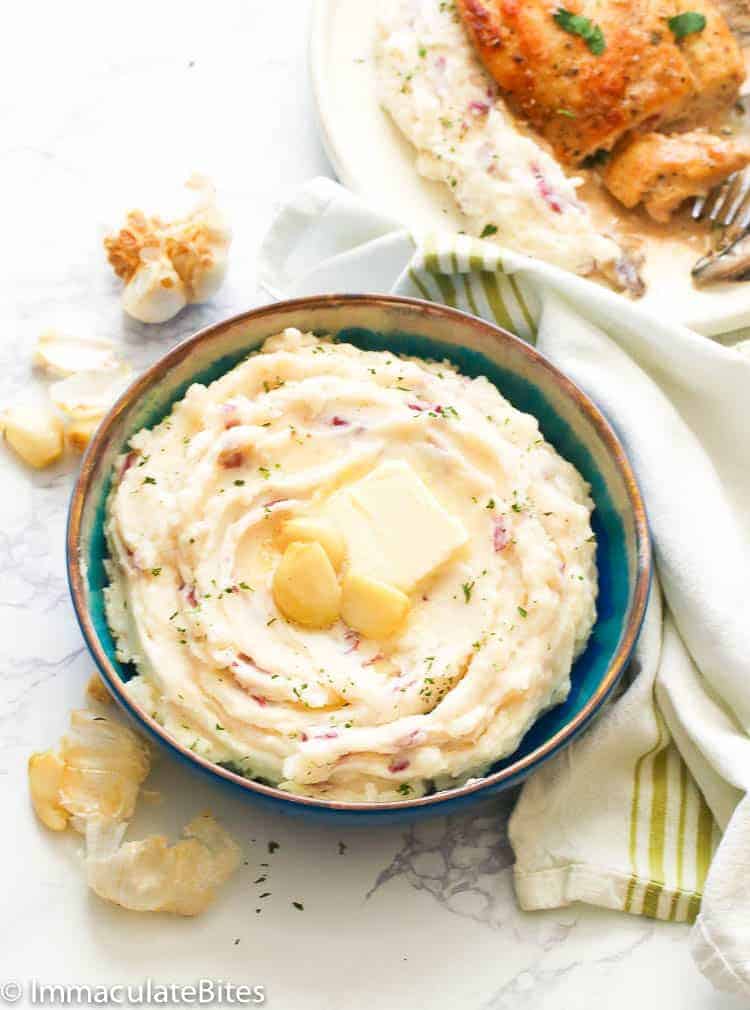 Garlic mashed red potatoes in a fancy bowl.