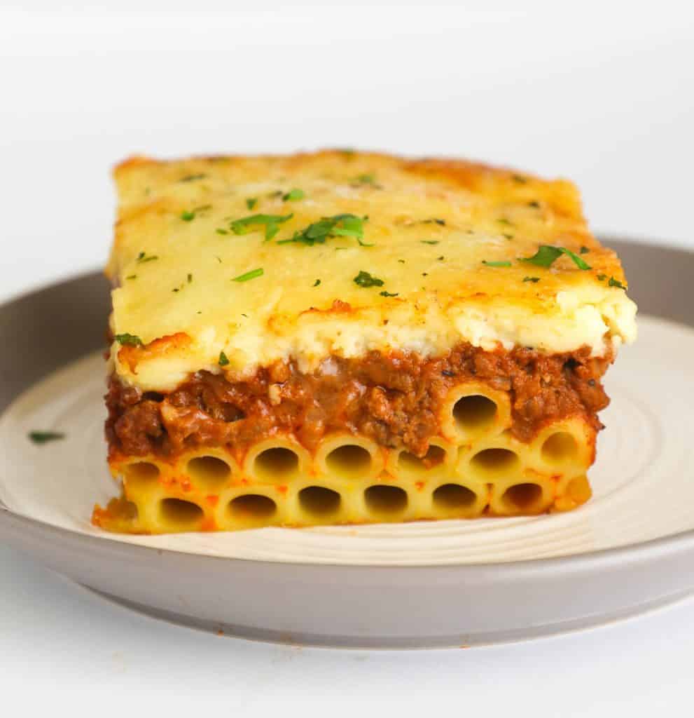 A big serving of Pastitsio on a white plate