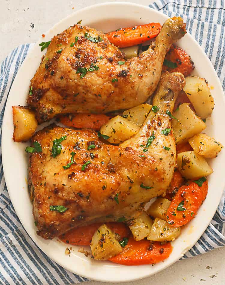 Baked Chicken Leg Quarters on white plate
