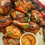 Peri Peri Chicken with piri piri sauce on the side for a spicy dinner