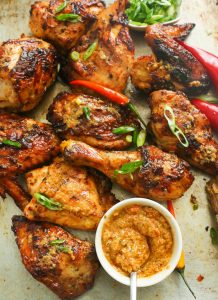 Peri Peri Chicken with piri piri sauce on the side for a spicy dinner