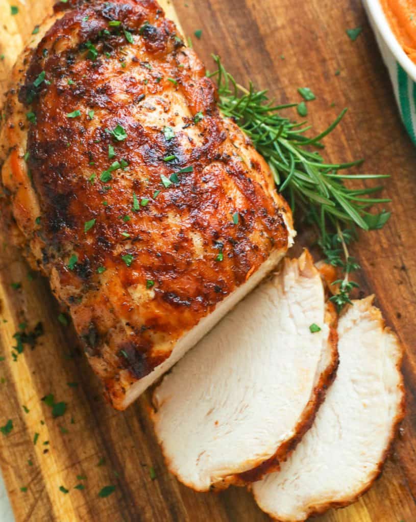 Sliced Instant Pot Turkey Breast on a Chopping Board