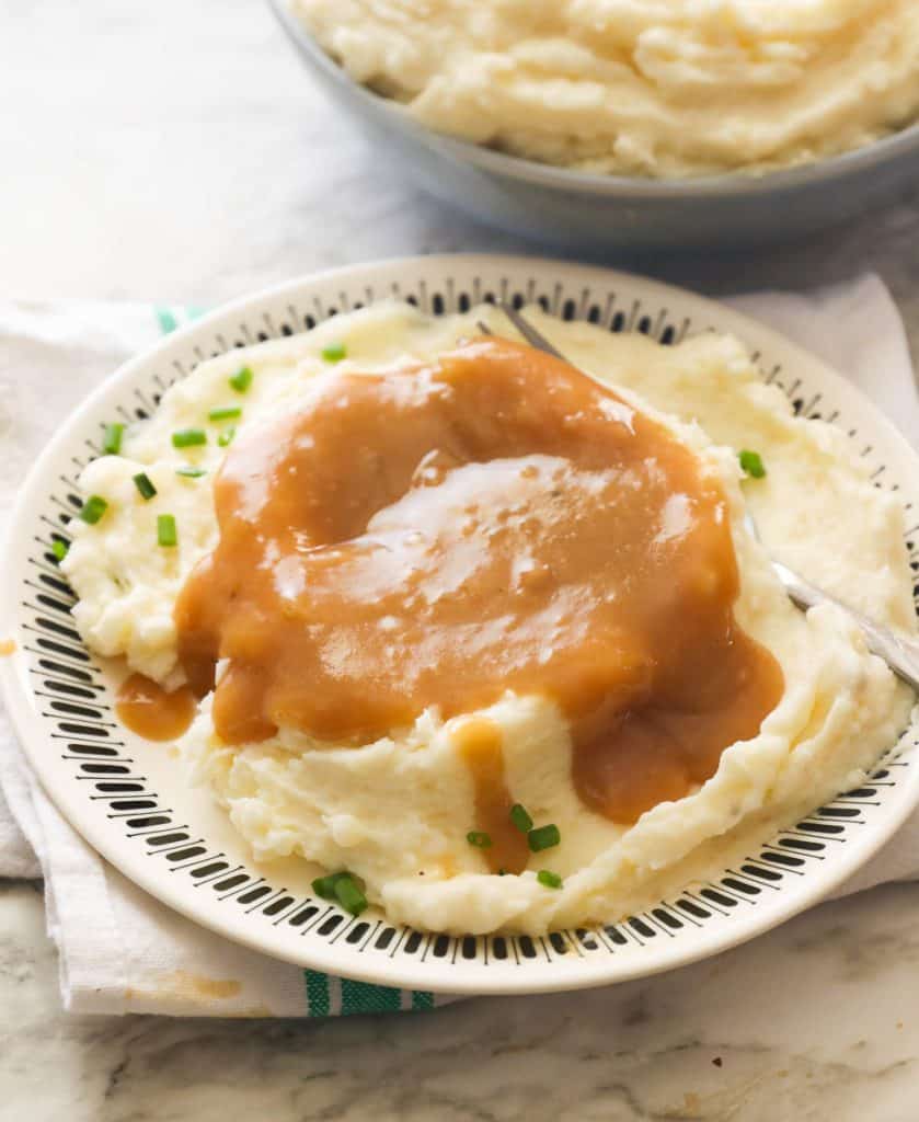 A Plate of Cream Cheese Mashed Potatoes Smothered with Brown Gravy