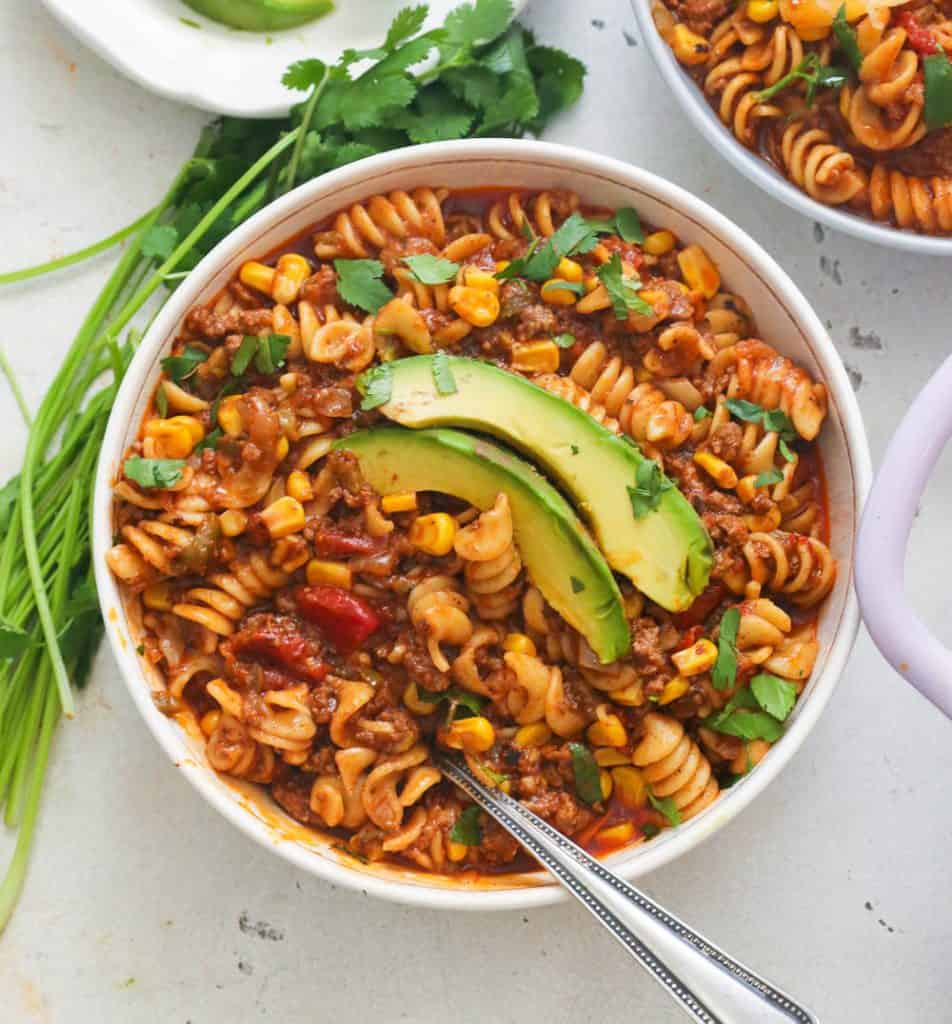 A Bowl of Taco Pasta Topped with Avocado Slices