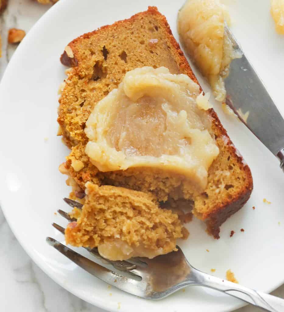 Pumpkin banana bread slice slathered with jam