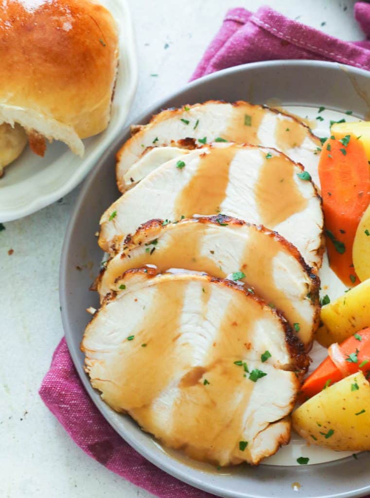 Sliced Instant Pot Turkey Breast Smothered with Gravy