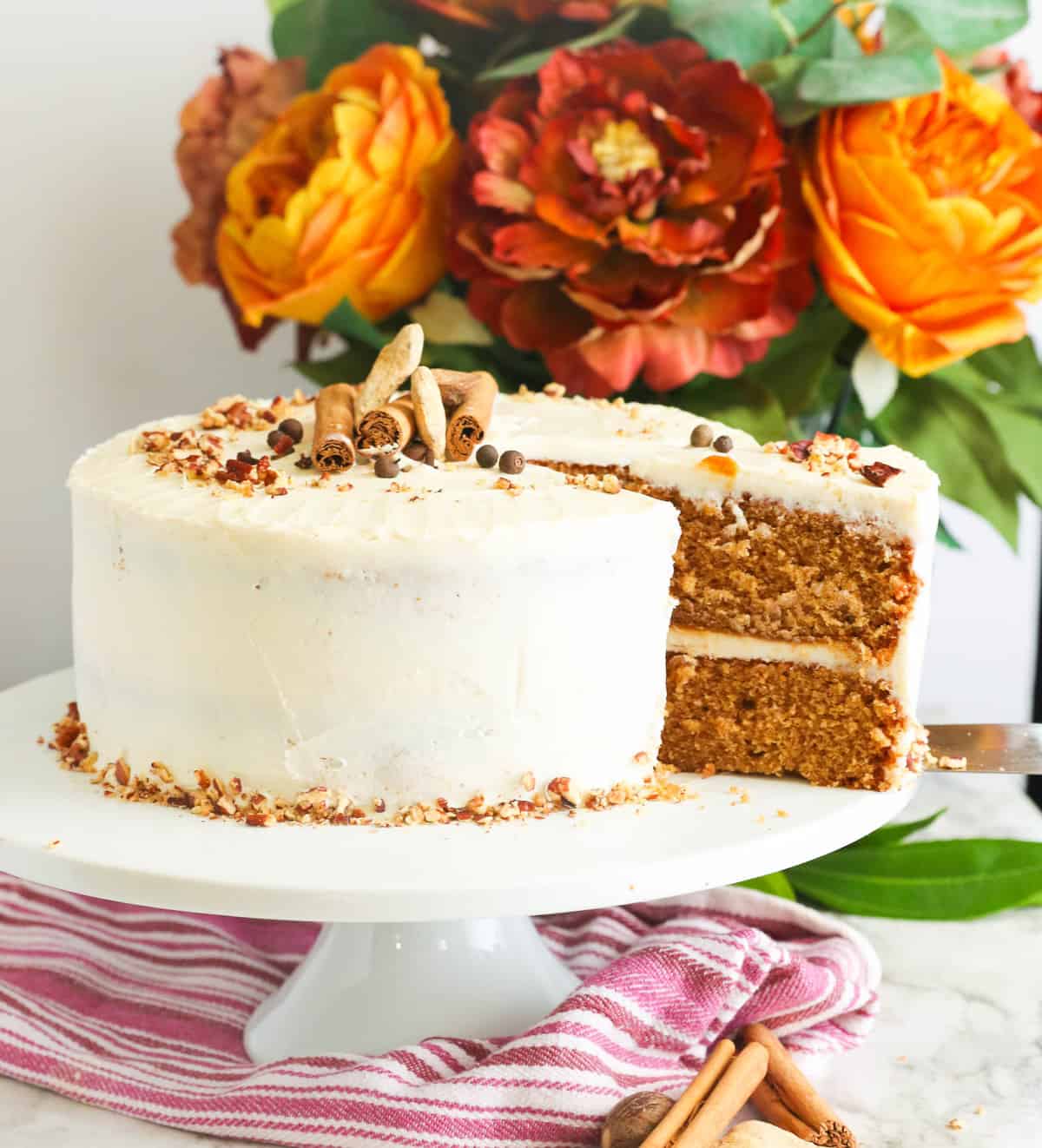 Fancy spice cake on a cake stand.