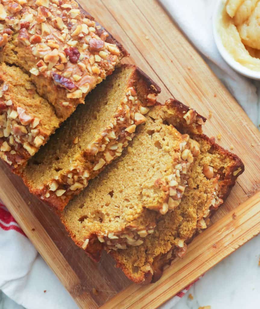 Easy Homemade Pumpkin Bread Topped with Chopped Nuts